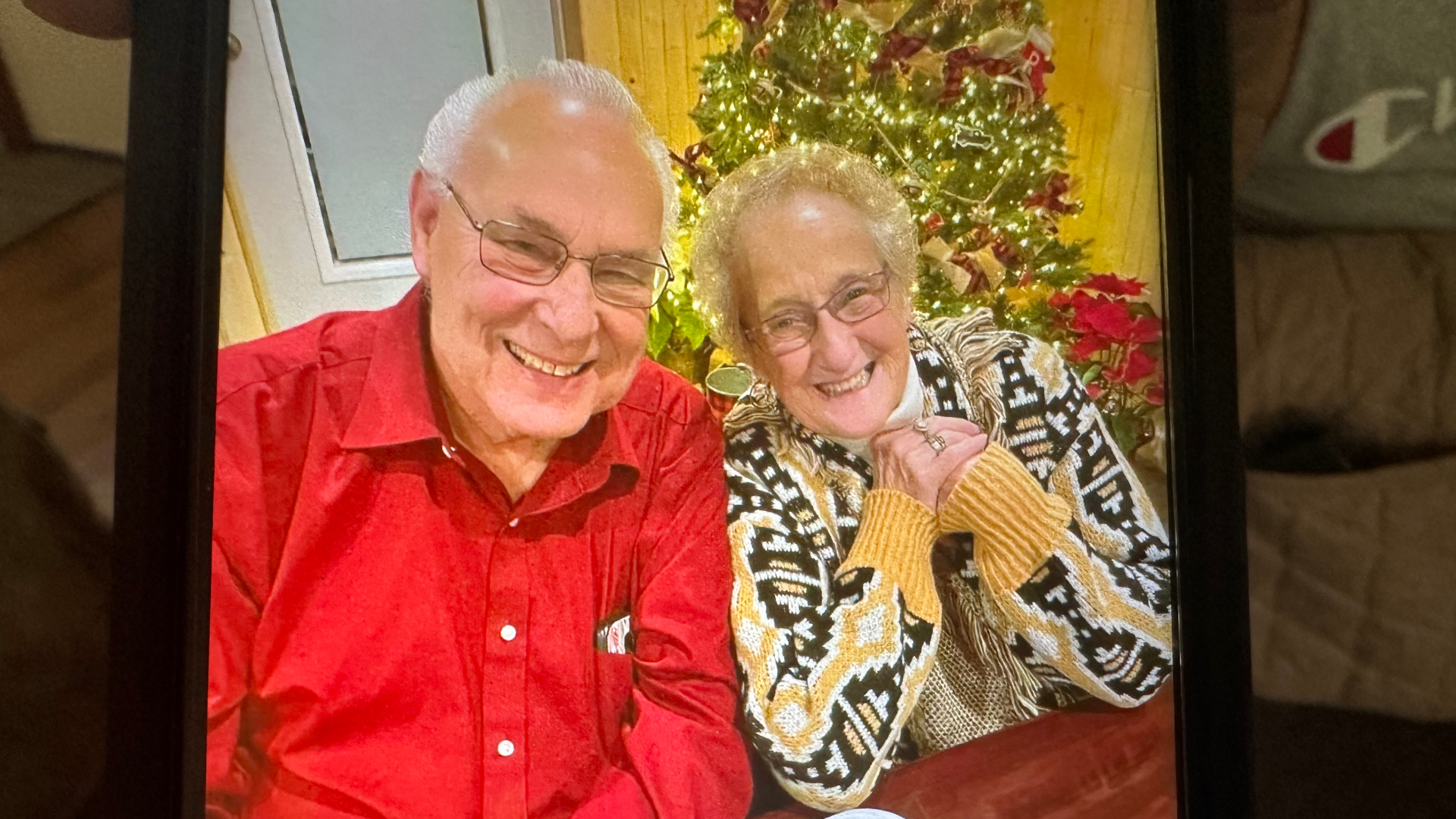 Deborah Soule holds up an image of Jessie and Virginia Seward. (June 28, 2024)