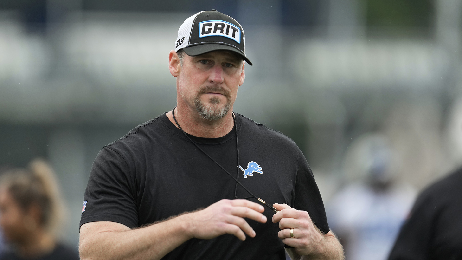 Detroit Lions coach Dan Campbell stepped on a riser and stood behind a new, large lectern at the team's training facility.
