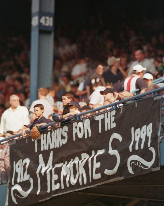 A black banner hangs over the upper-deck railing of Tiger Stadium that reads “Thanks for the memories: 1912-1999.” (Jeff Kowalsky/Getty Images)