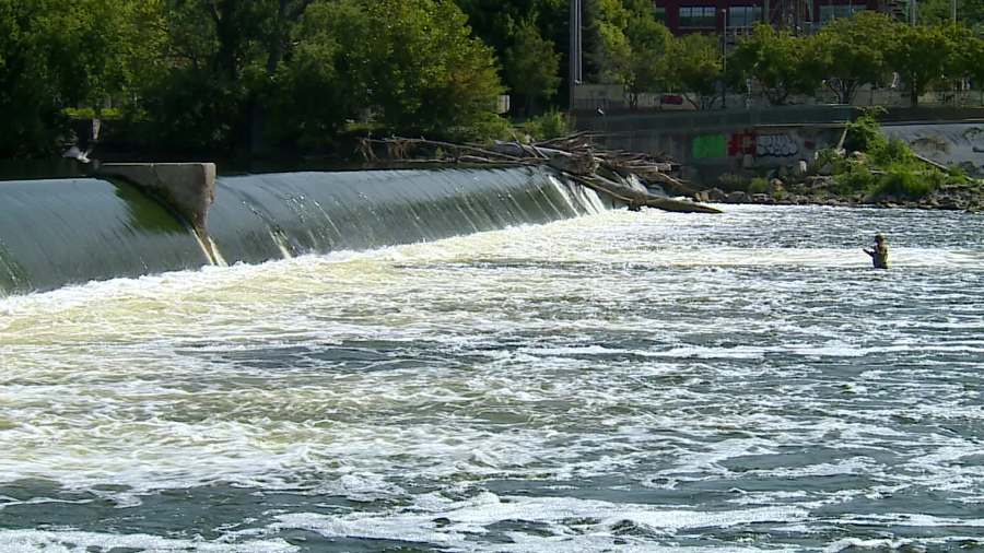 A fisherman on the Grand River in Grand Rapids. (Aug. 22, 2024)