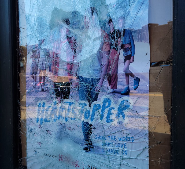 A photo of a shattered window at Lowry's Books in Three Rivers. (Courtesy Andrew George, Three Rivers Pride).