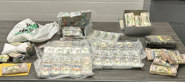 A photo provided by the Grand Rapids Police Department shows drugs and money confiscated during a Sept. 3, 2024, search.