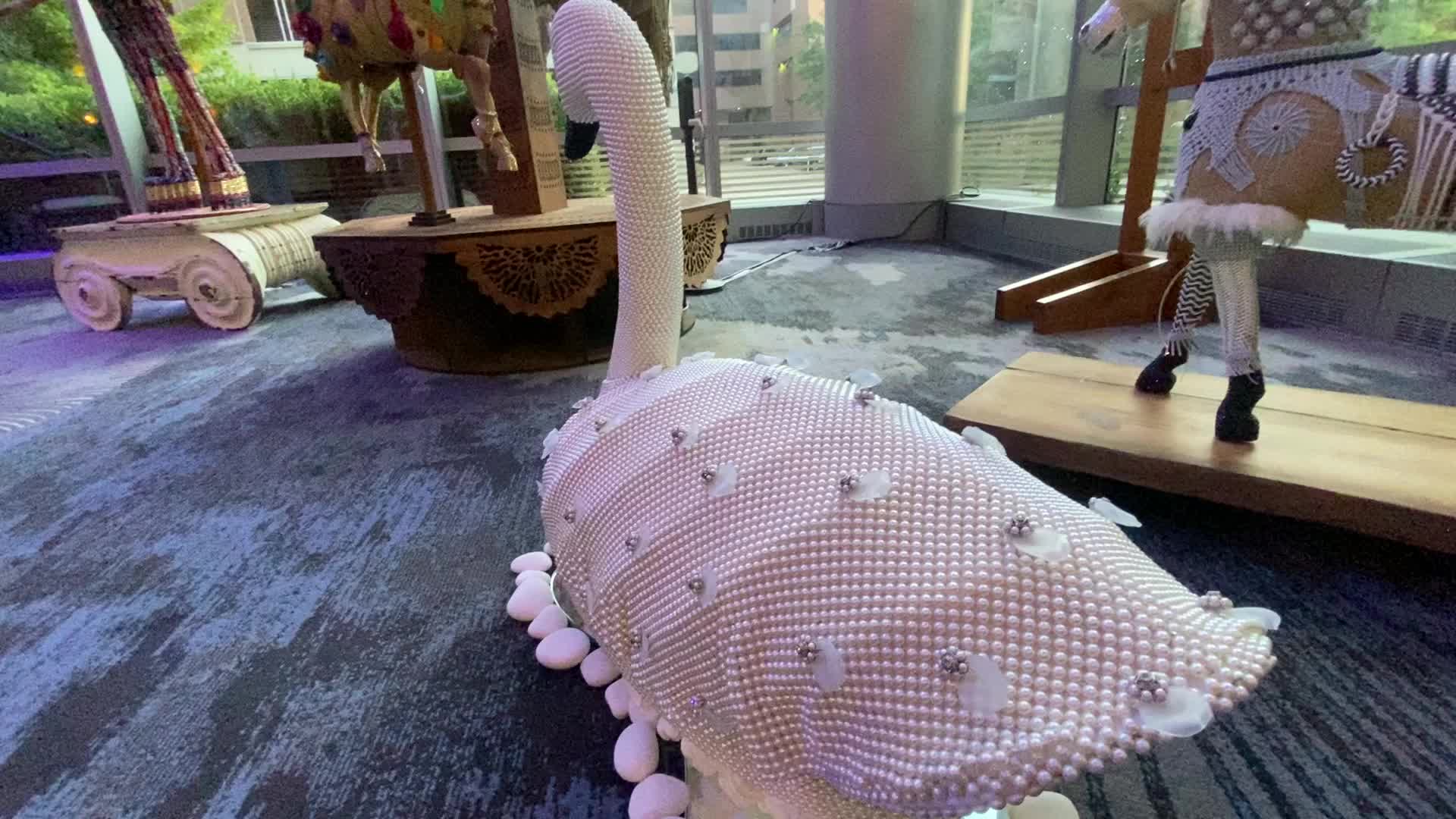 Marv Graff's ArtPrize piece entitled, "I'll Be Swan" on display at the JW Mariott. (Sept. 19, 2024)