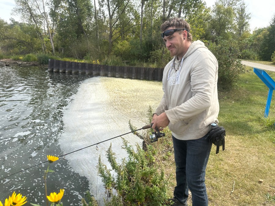 Brandon Shumaker fishes on Muskegon Lake on Monday, Sept. 23, 2024.