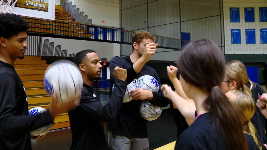 Grand Valley State University basketball players work with people with disabilities through the Beautiful Lives Project's Court of Dreams event on Sept. 18, 2024.