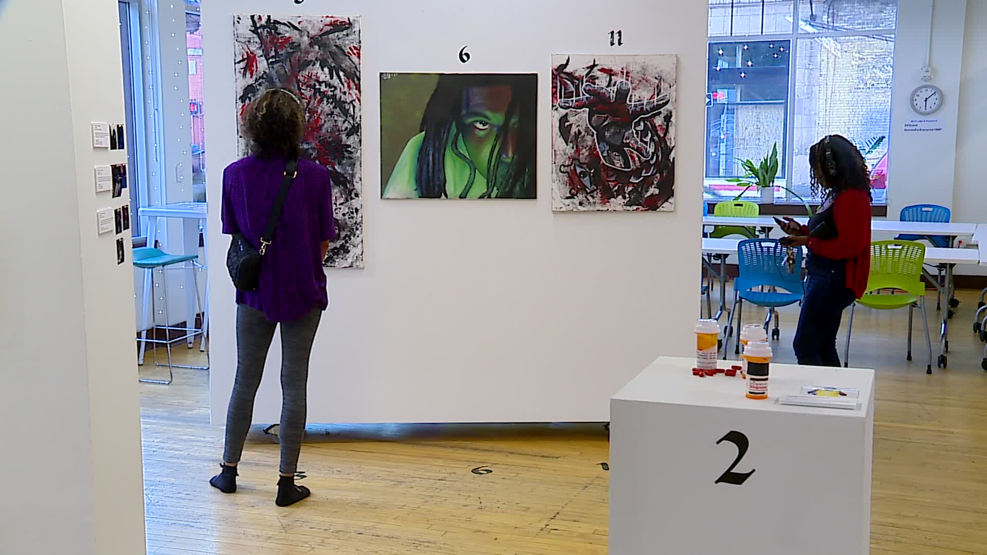ArtPrize entry "Trauma Project," a collection of 16 paintings by more than 20 artists from Grand Rapids. (Sept. 26, 2024)