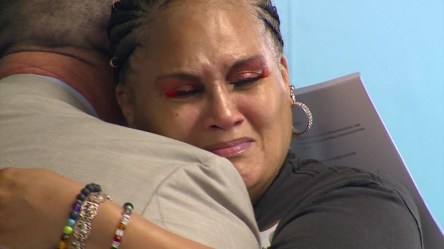 Kelly Palmer gets emotional as she graduates from Kent County's mental health treatment court on Sept. 19, 2024.