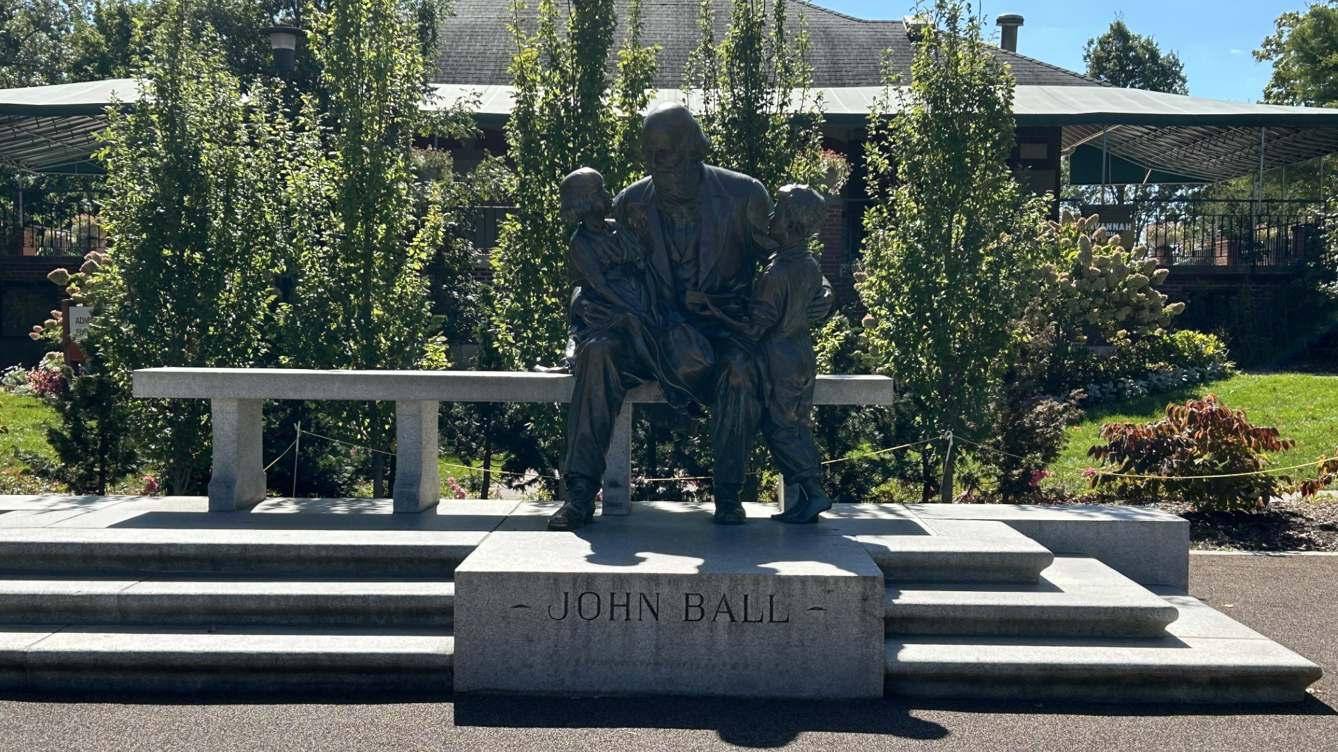 A statue of John Ball and two young children was sculpted by Pompeo Coppini and installed at John Ball Park in 1925. It now resides outside the entrance to the zoo. (Matt Jaworowski/WOOD TV8)