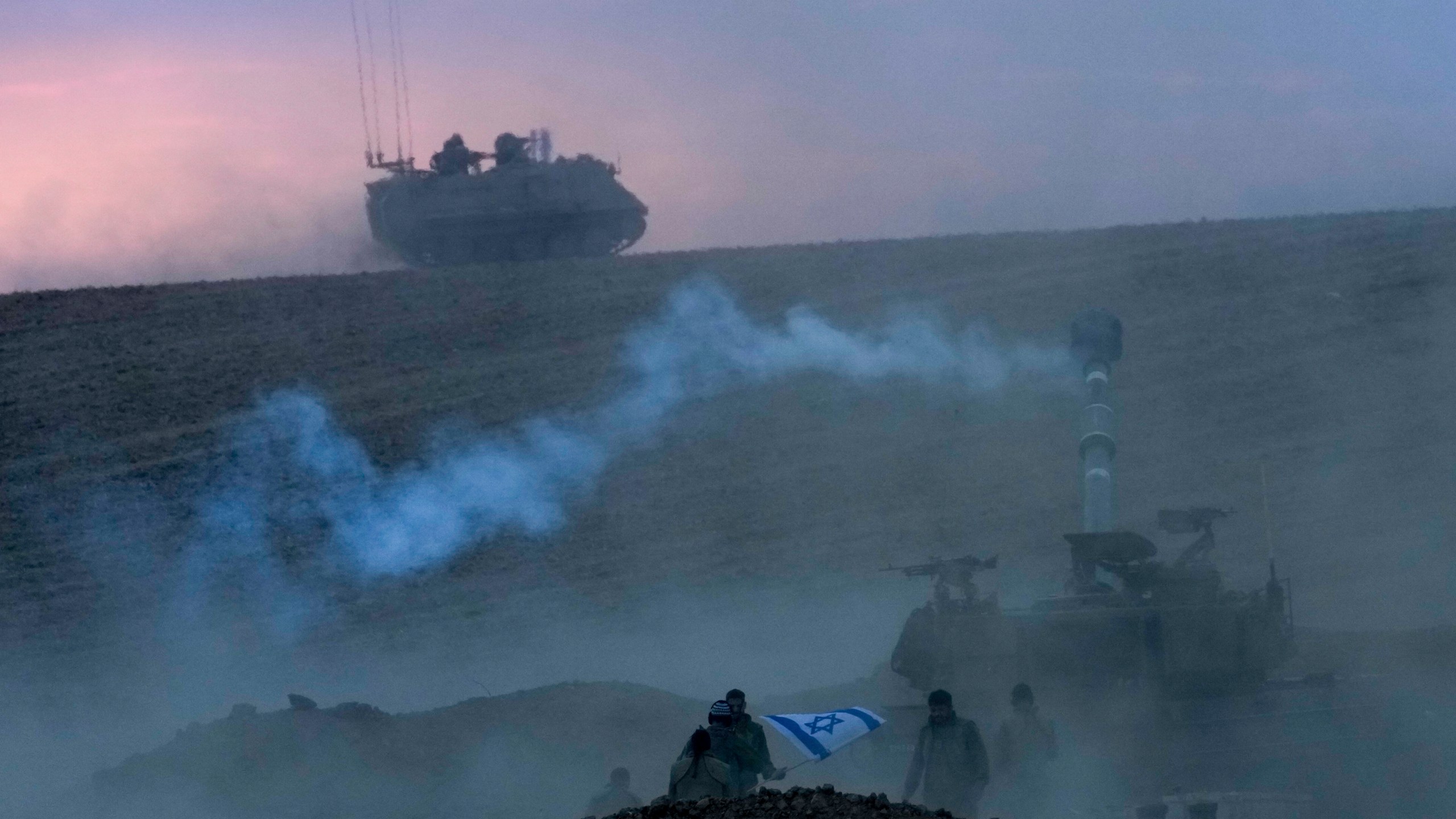 An Israeli mobile artillery unit fires a shell from southern Israel toward the Gaza Strip, in a position near the Israel-Gaza border, Israel, Saturday, Oct. 14, 2023. (AP Photo/Maya Alerruzzo)