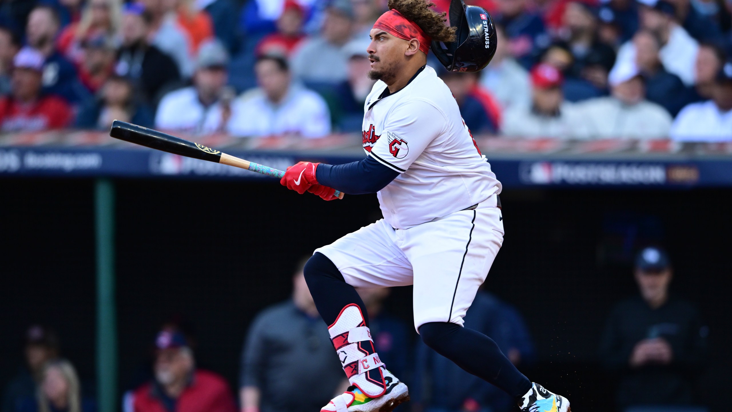 Cleveland Guardians' Josh Naylor doubles in the fifth inning during Game 2 of baseball's AL Division Series against the Detroit Tigers, Monday, Oct. 7, 2024, in Cleveland. (AP Photo/David Dermer)