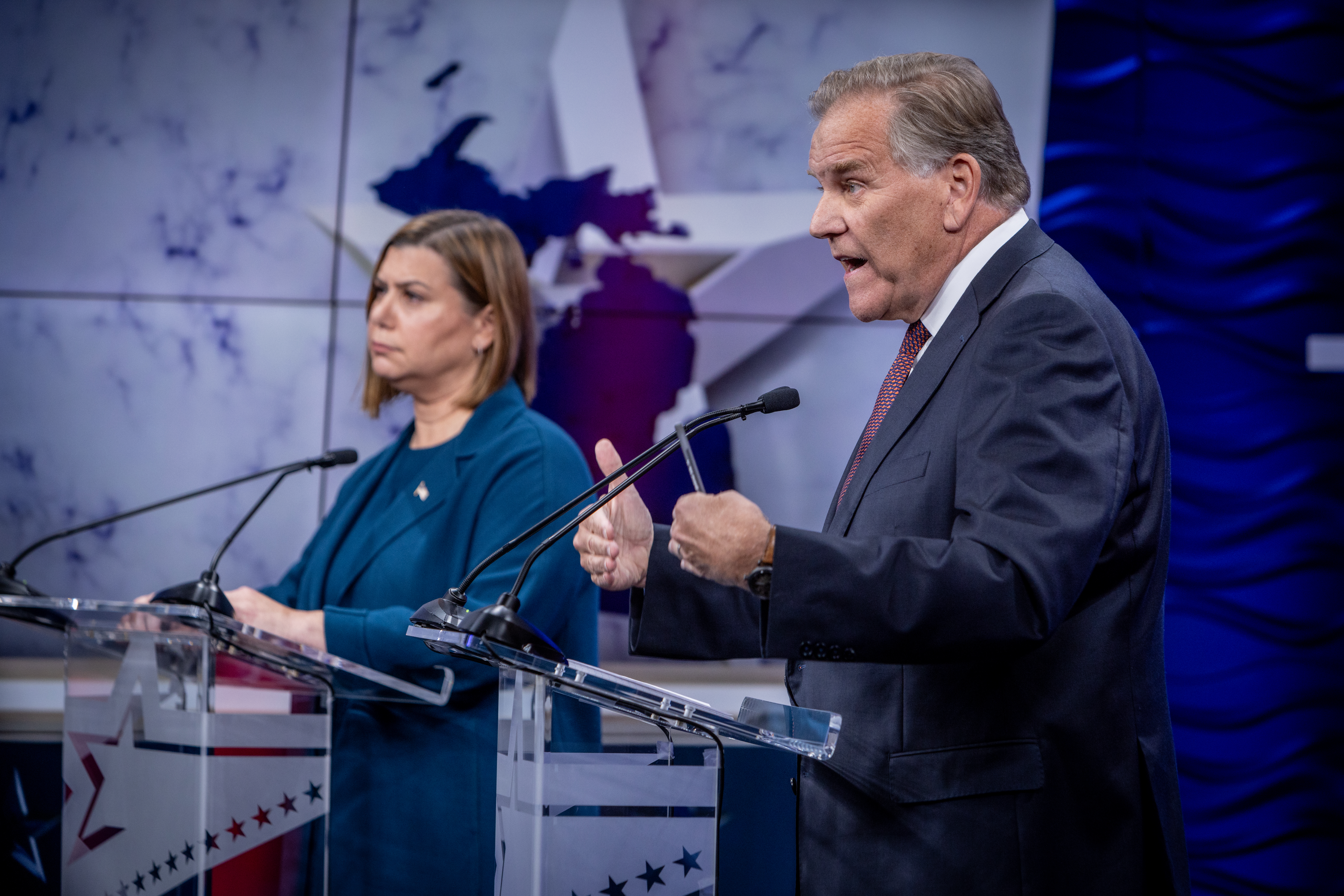 Former U.S. Rep. Mike Rogers and U.S. Rep. Elissa Slotkin at a debate hosted by WOOD TV8 on Oct. 8, 2024. (Michael Buck / WOOD TV8)