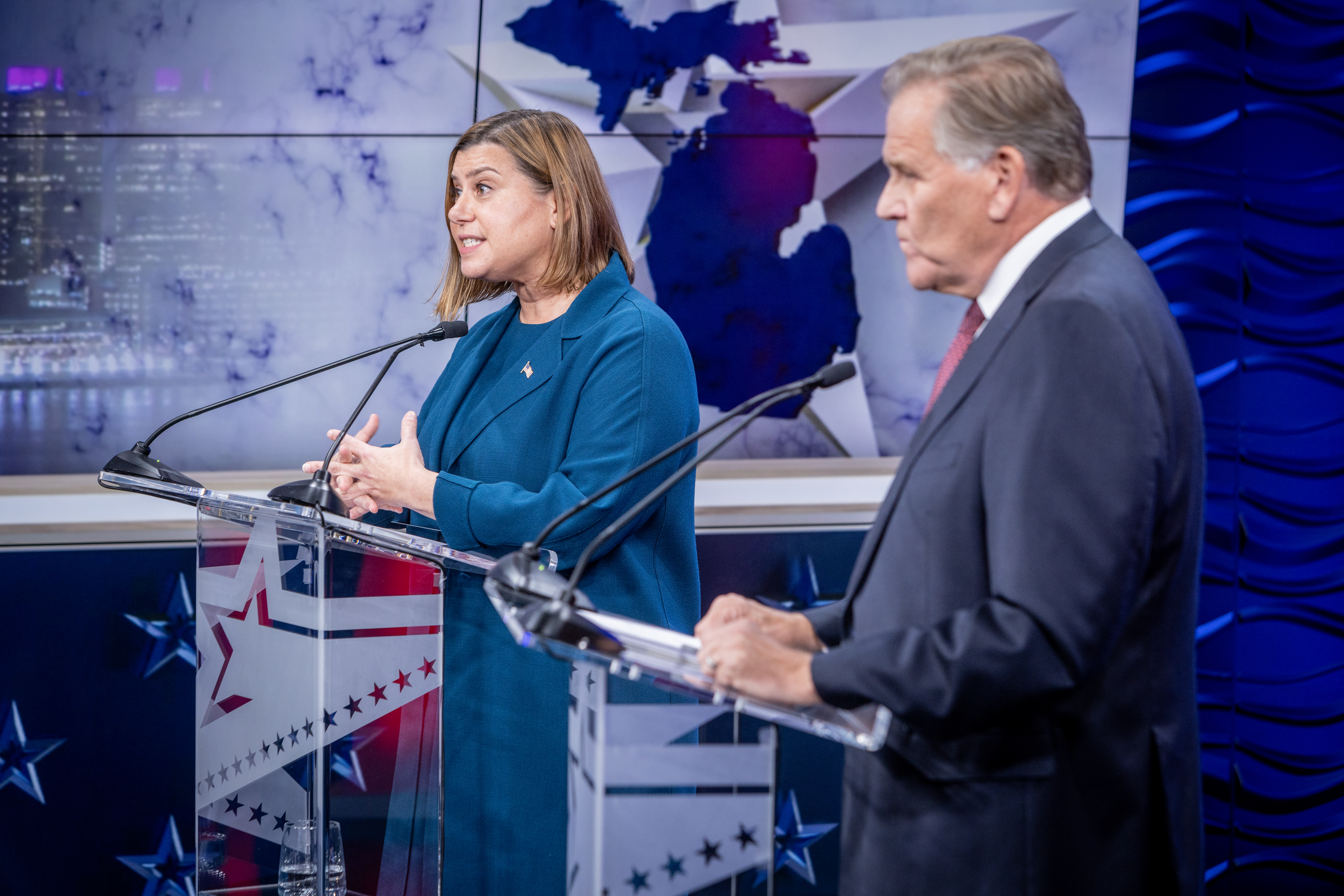 Former U.S. Rep. Mike Rogers and U.S. Rep. Elissa Slotkin at a debate hosted by WOOD TV8 on Oct. 8, 2024. (Michael Buck / WOOD TV8)