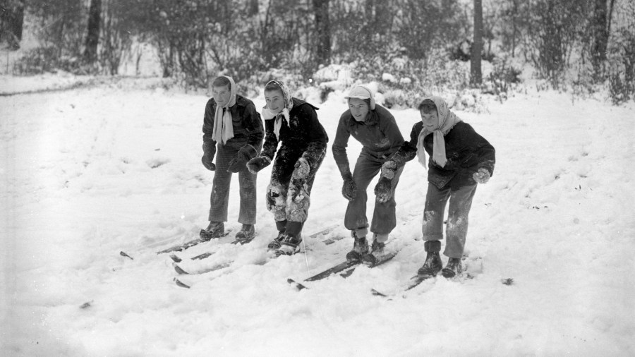 Four children ride skis at John Ball Park on Nov. 28, 1947. (Courtesy Grand Rapids Public Library)