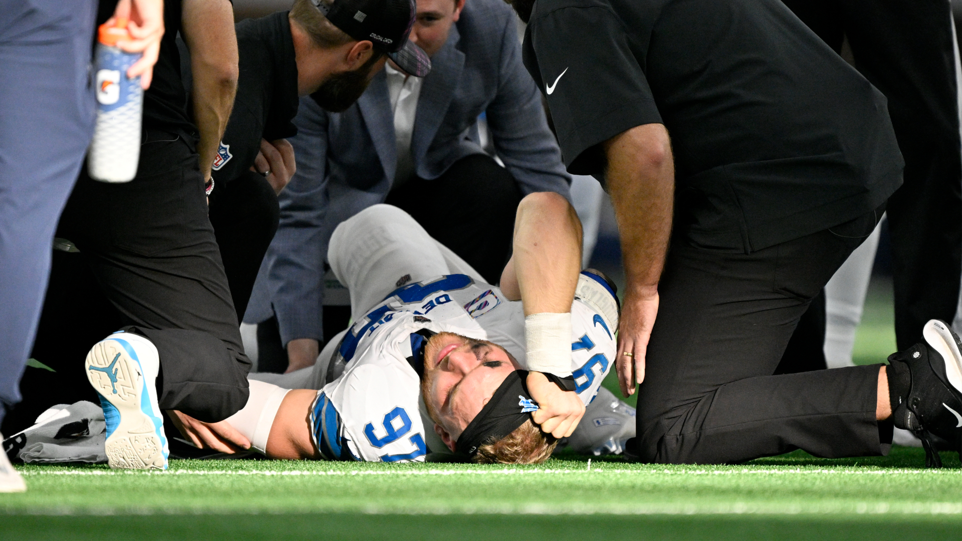 Detroit Lions' Aidan Hutchinson is in obvious pain after suffering an ugly leg injury in the team's 47-9 win over Dallas on Sunday, Oct. 13, 2024. (Jerome Miron/AP)