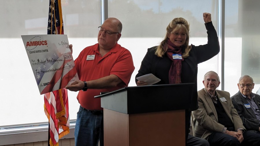 The Grand Rapids chapter of AMBUCS presented the Marge Wilson Community Service Award and a $2,500 check to the Michigan Horse Driving School in Saranac during an event in Wyoming on Oct. 16, 2024.