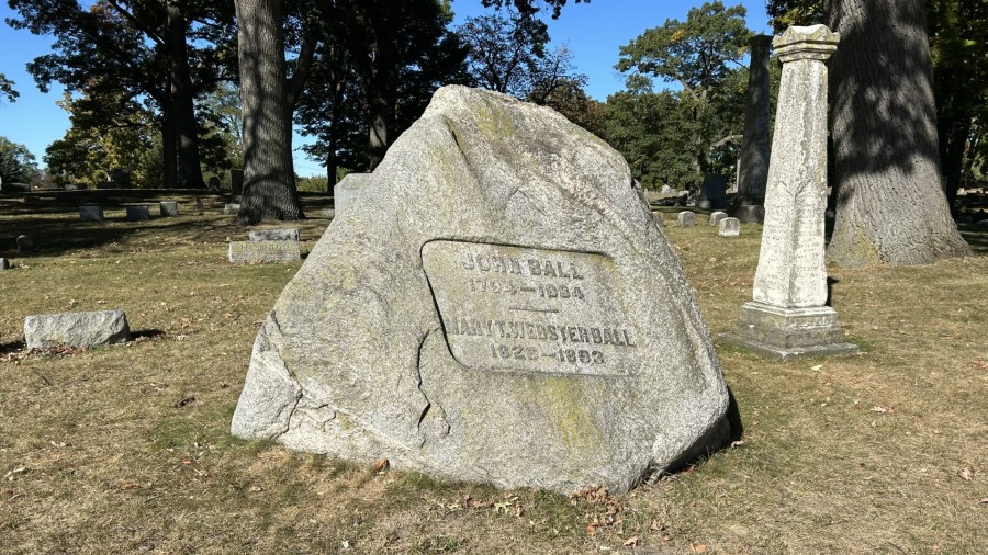 A giant stone marks the grave of John Ball and his wife, Mary, at Fulton Street Cemetery near downtown Grand Rapids. (Matt Jaworowski/WOOD TV8)