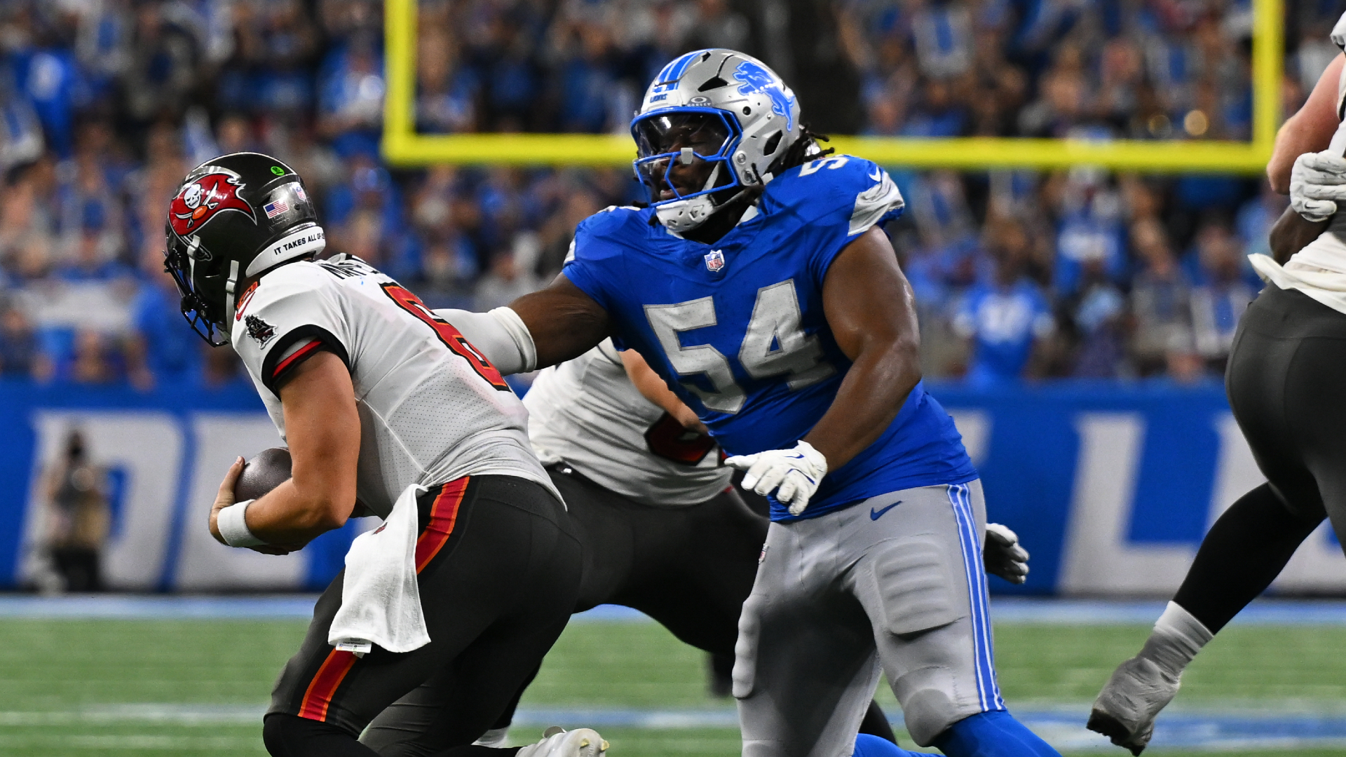 Detroit Lions defensive tackle Alim McNeill pressures Tampa Bay quarterback Baker Mayfield during their Week 2 showdown at Ford Field on Sept. 15, 2024. (Steven King/Getty Images)