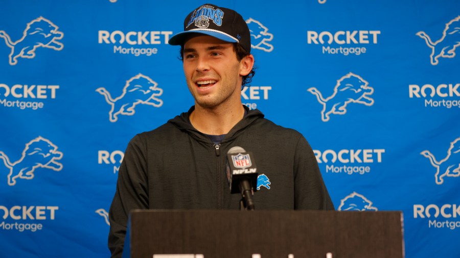Detroit Lions place kicker Jake Bates speaks to the media after an NFL football game against the Minnesota Vikings, Sunday, Oct. 20, 2024, in Minneapolis. (AP Photo/Bruce Kluckhohn)