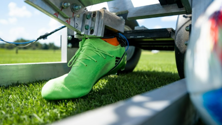 Michigan State University experts showcase a custom designed FLEX machine (foot lower extremities) to test plots of turfgrass. (Courtesy MSU Today)