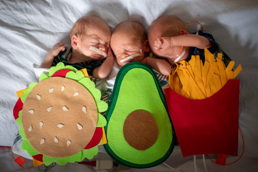 Wilder, Milo, and Cyrus are fraternal triplets wearing foods their Mom ate while pregnant. (Courtesy Corewell Health)