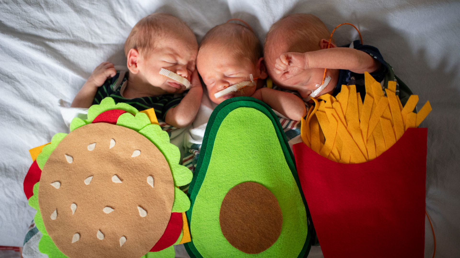 Wilder, Milo, and Cyrus are fraternal triplets wearing foods their Mom ate while pregnant. (Courtesy Corewell Health)