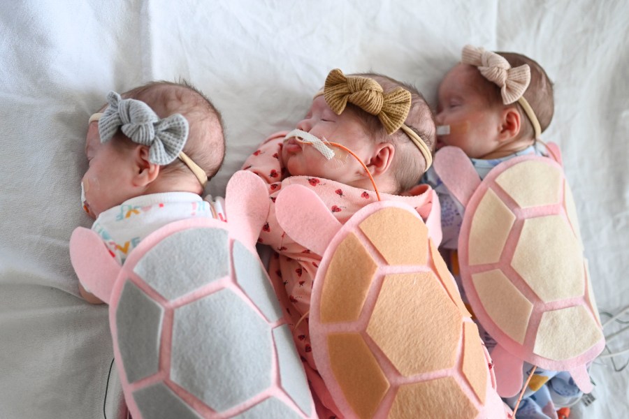 Akeelah, Alyiah, and Adrianna are matching pink sleepy turtles. (Courtesy Corewell Health)