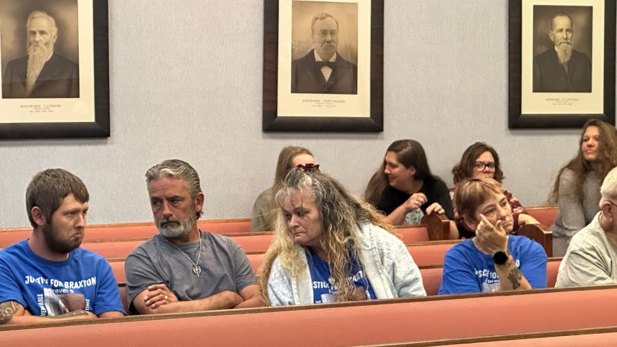 Braxton Dykstra's family sits in a courtroom in White Cloud on Oct. 29, 2024, as the child's grandmother takes a plea deal in connection to his death.