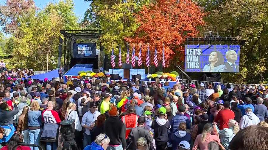 People gather for a rally for Vice President Kamala Harris at Grand Rapids' Riverside Park on Oct. 18, 2024.