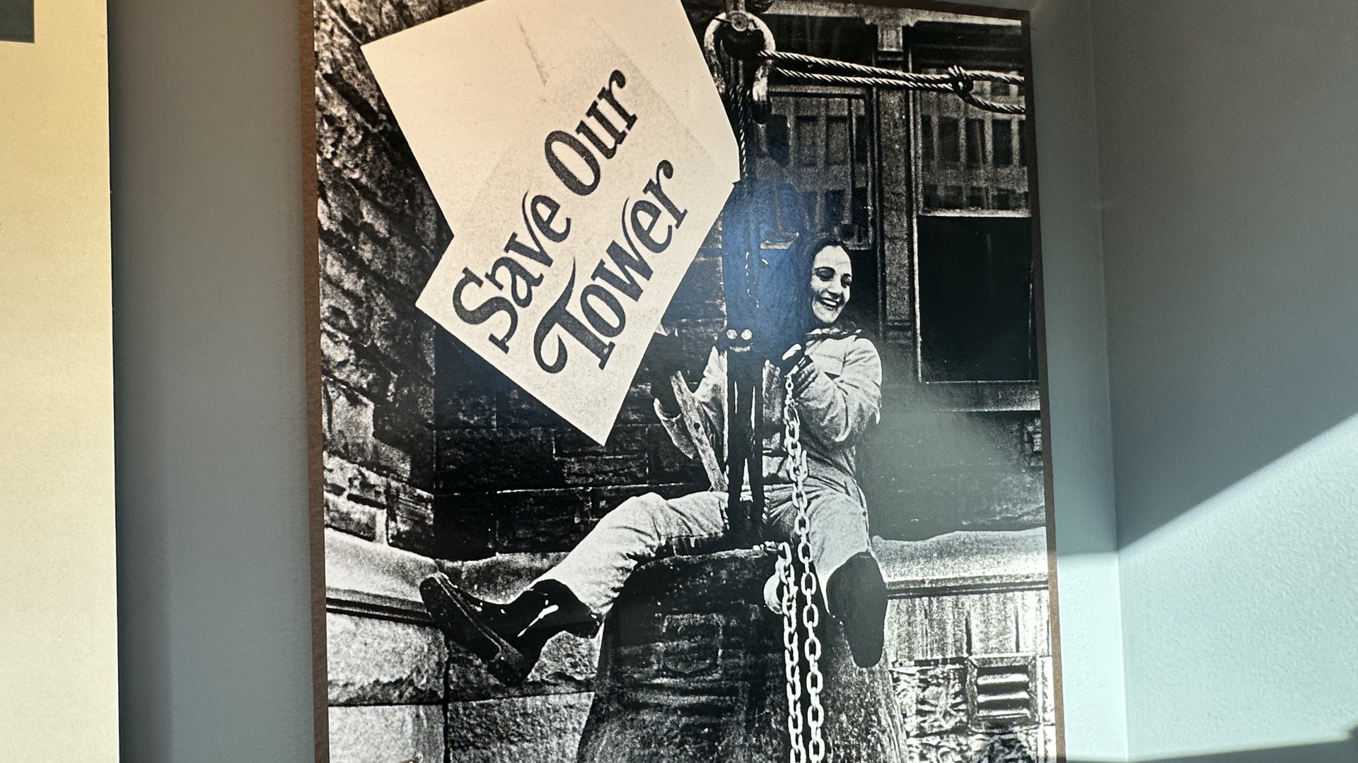A photo of Mary Stiles protesting the demolition of the old Grand Rapids City Hall on display at the Grand Rapids Public Museum. (October 2024)