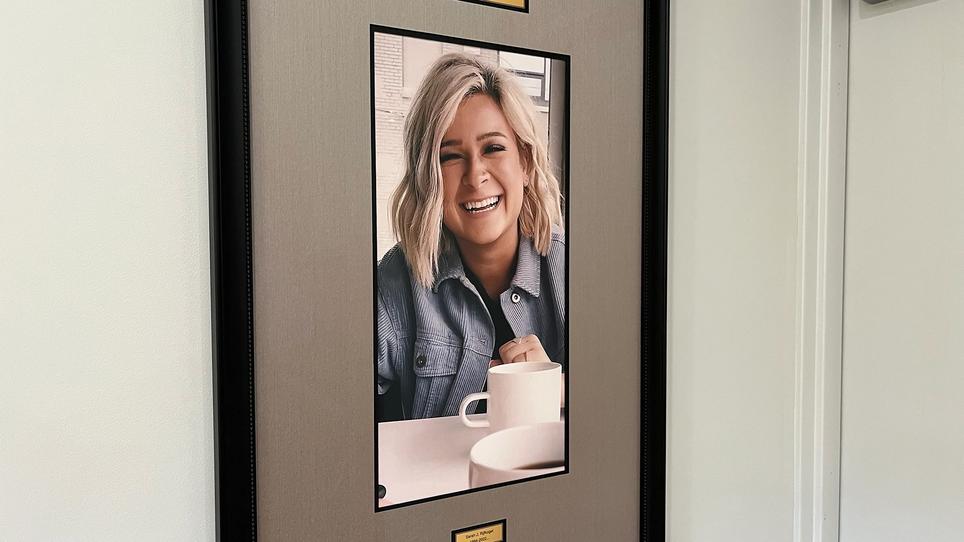A plaque showing Sarah Rijfkogel's photo at Studio 33:3. (Oct. 22, 2024)