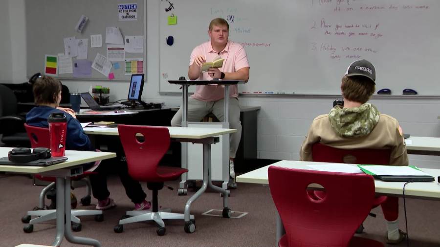 Luke Marsh is a Hope College offensive lineman and a teacher at Spring Lake High School.