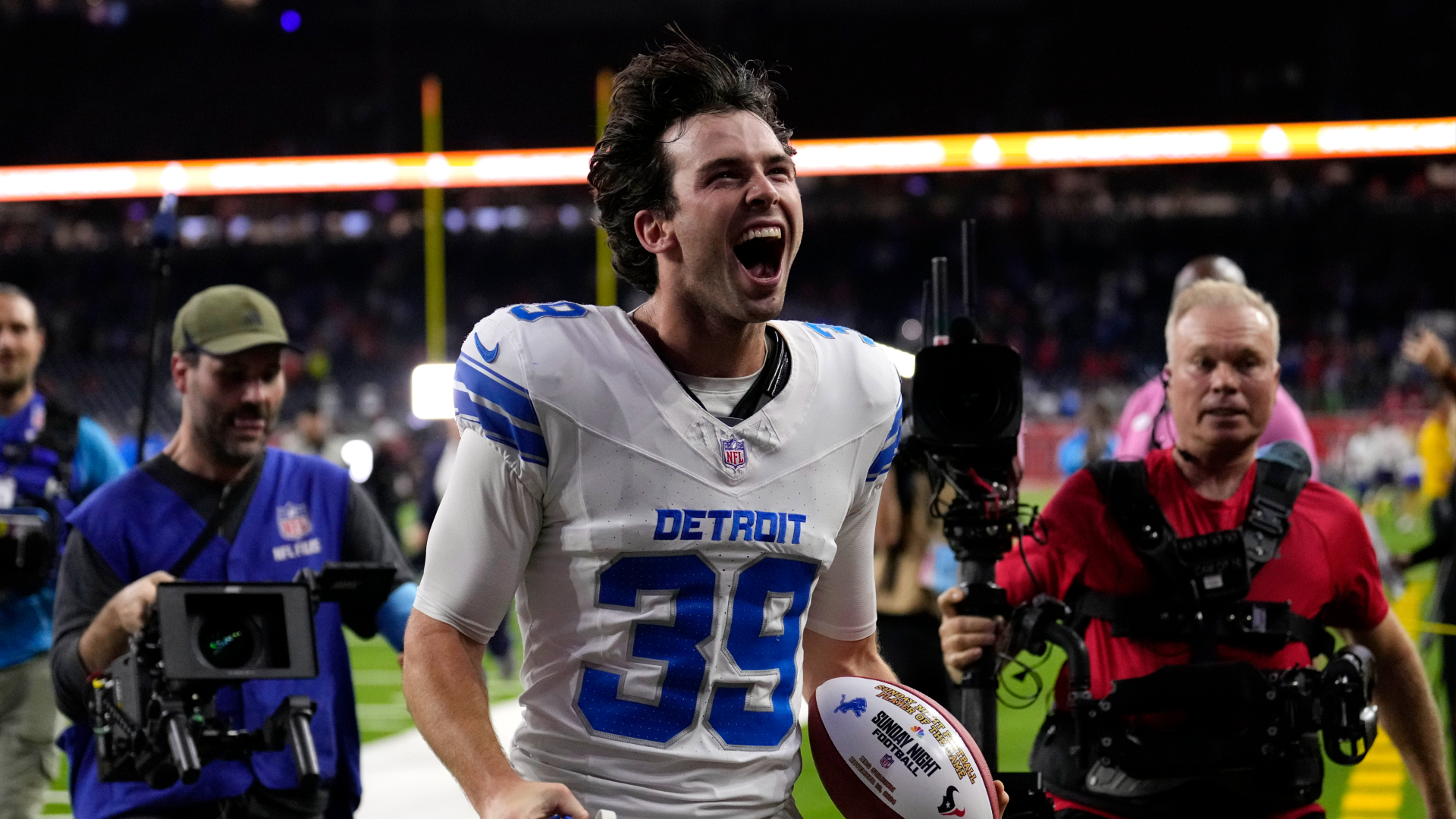 Detroit Lions kicker Jake Bates runs off the field after hitting a 52-yard field goal to secure a 26-23 win over the Texans on Sunday, Nov. 10, 2024, in Houston. (David J. Phillip/AP)