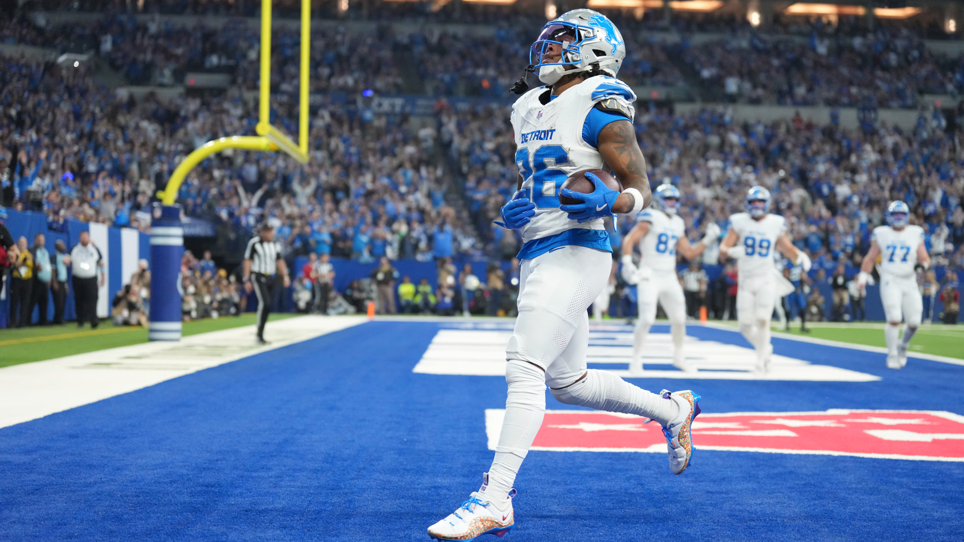 Detroit Lions running back Jahmyr Gibbs (26) runs into the endzone for a 1-yard rushing touchdown during the first half of an NFL football game against the Indianapolis Colts, Sunday, Nov. 24, 2024, in Indianapolis. (AP Photo/AJ Mast)