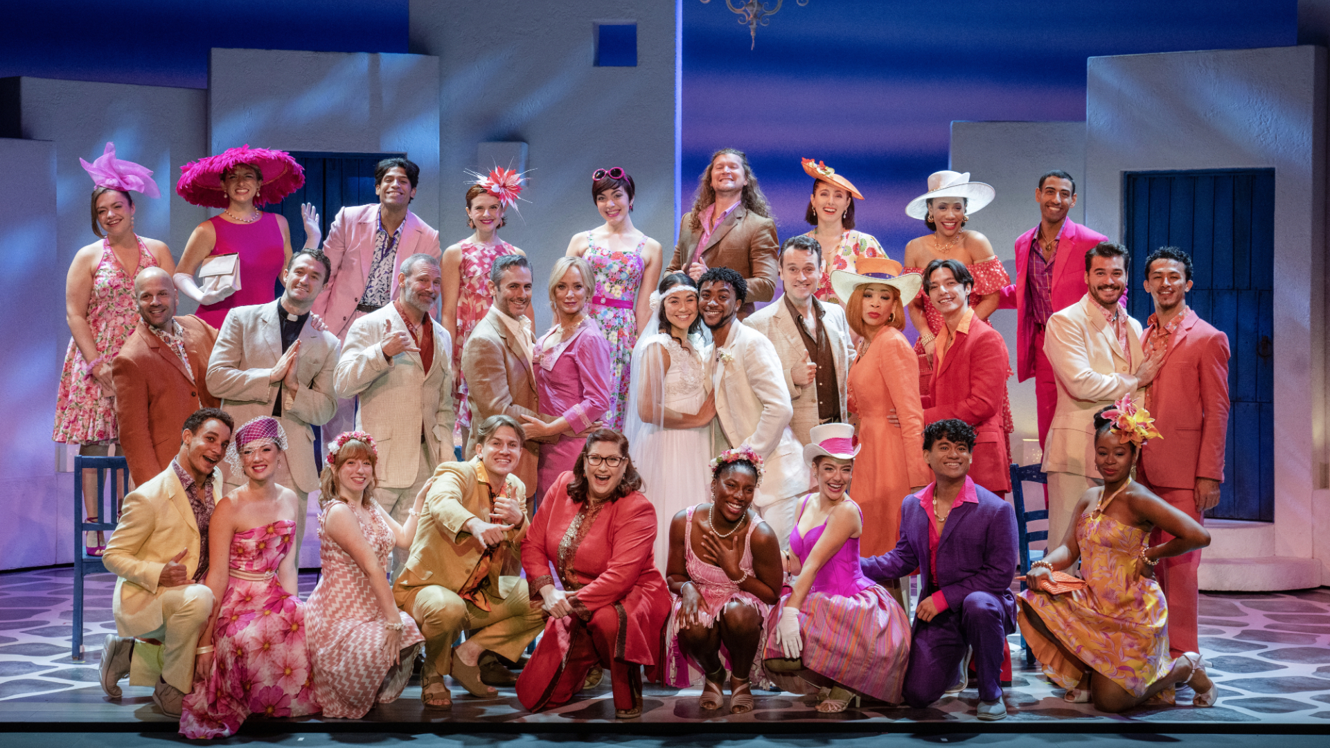 Grand Rapids native Blake Price, middle row second from left in the priest costume, got to perform in "Mamma Mia!" in his hometown. (Courtesy Joan Marcus/Broadway Grand Rapids)