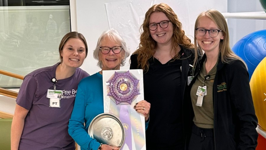 Monica Adair and her therapists. (Courtesy Mary Free Bed)