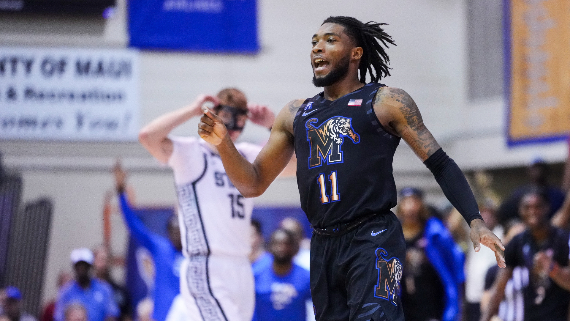 Memphis guard Tyrese Hunter (11) reacts to scoring against Michigan State during the second half of an NCAA college basketball game at the Maui Invitational Tuesday, Nov. 26, 2024, in Lahaina, Hawaii. Memphis won 71-63. (AP Photo/Lindsey Wasson)