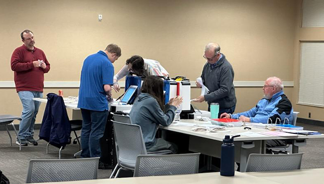 Poll workers count ballots at Ottawa County Administration Complex in Olive Township. (Nov. 5, 2024)