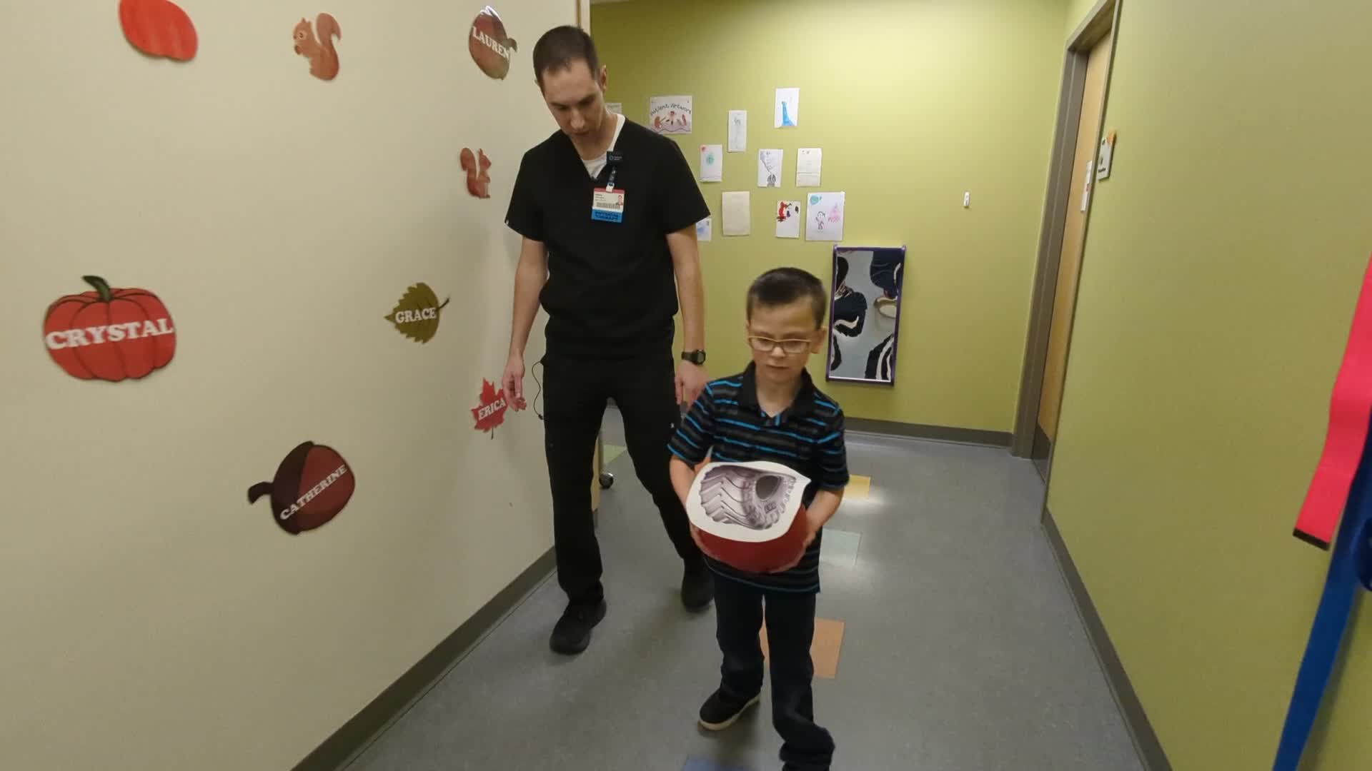 Levi Berens works with a physical therapist. (Nov. 28, 2024)