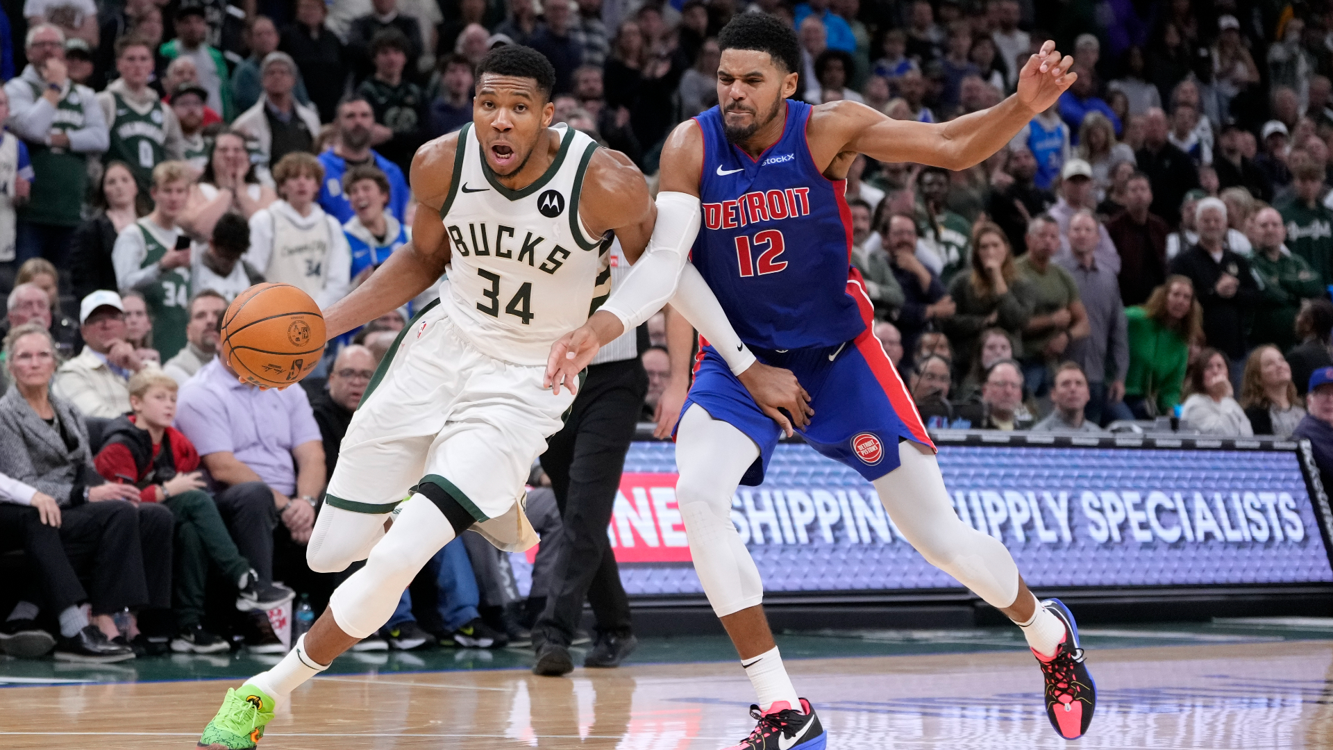 Milwaukee Bucks' Giannis Antetokounmpo gets past Detroit Pistons' Tobias Harris during the second half of an NBA basketball game Wednesday, Nov. 13, 2024, in Milwaukee. (AP Photo/Morry Gash)