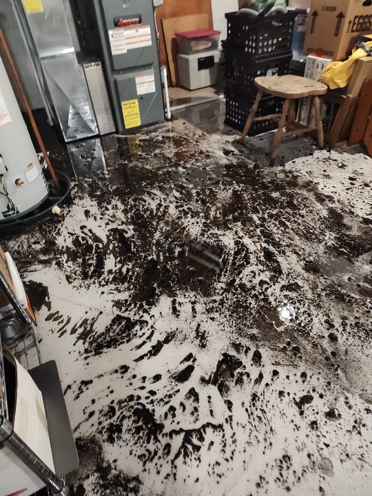 The damage to Tom Schurino's Grand Rapids home after a June water main break. (Courtesy)
