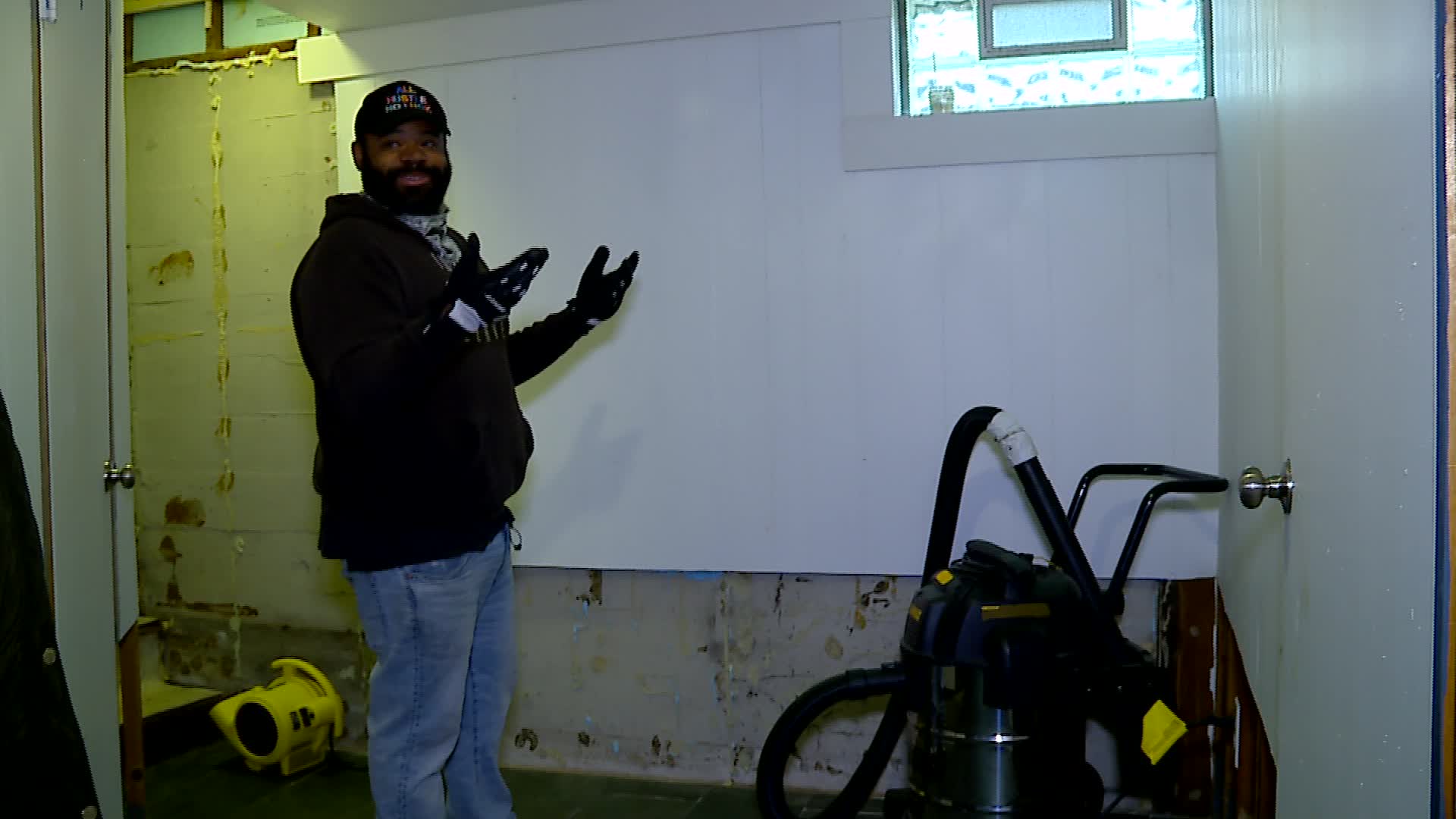 Larry Gibbs shows News 8 the damage to his Grand Rapids home after a June water main break. (Nov. 22, 2024)