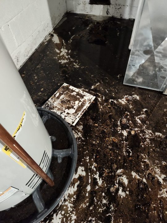 The damage to Tom Schurino's Grand Rapids home after a June water main break. (Courtesy)