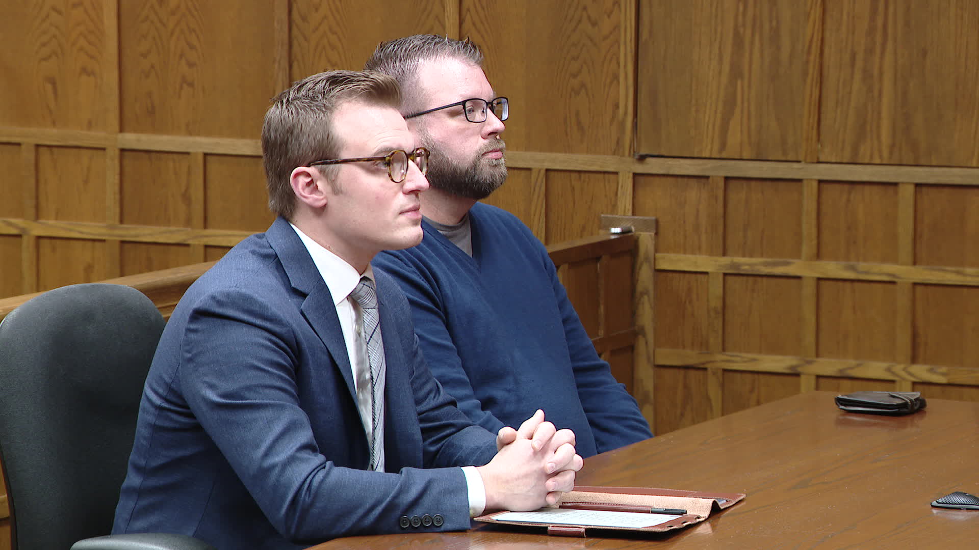 Stephen Jacobsen, background) sits next to his attorney in a Walker courtroom on Nov. 26, 2024.