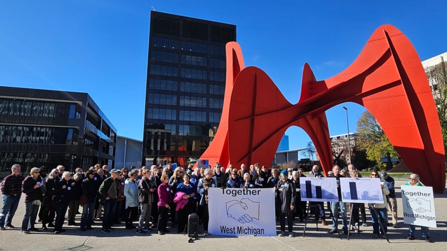 The Together West Michigan holds a news conference outside Grand Rapids City Hall on Nov. 12, 2024.