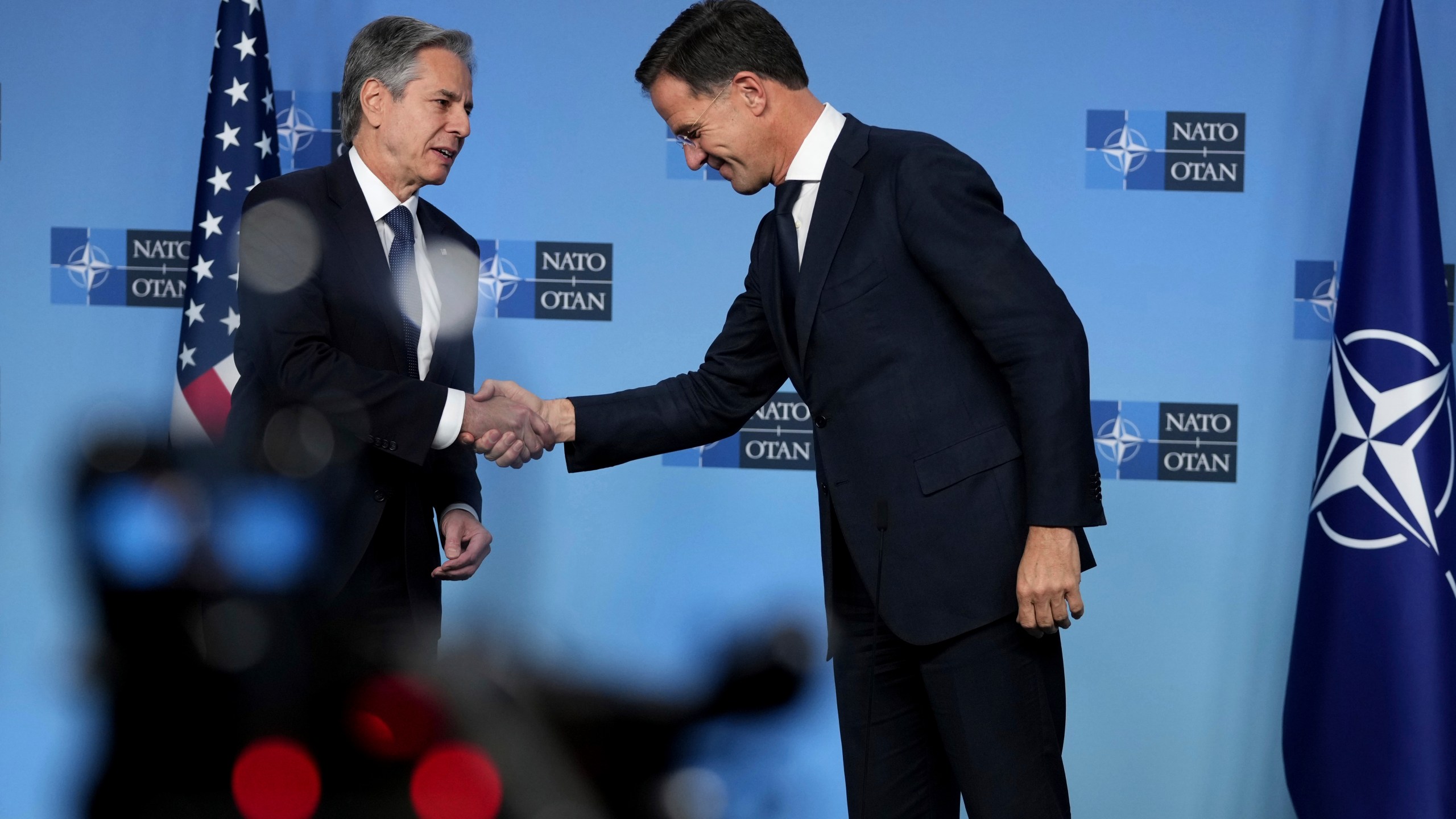 NATO Secretary General Mark Rutte, right, shakes hands with United States Secretary of State Antony Blinken during a meeting of NATO foreign ministers at NATO headquarters in Brussels,Tuesday, Dec. 3, 2024. (AP Photo/Virginia Mayo)