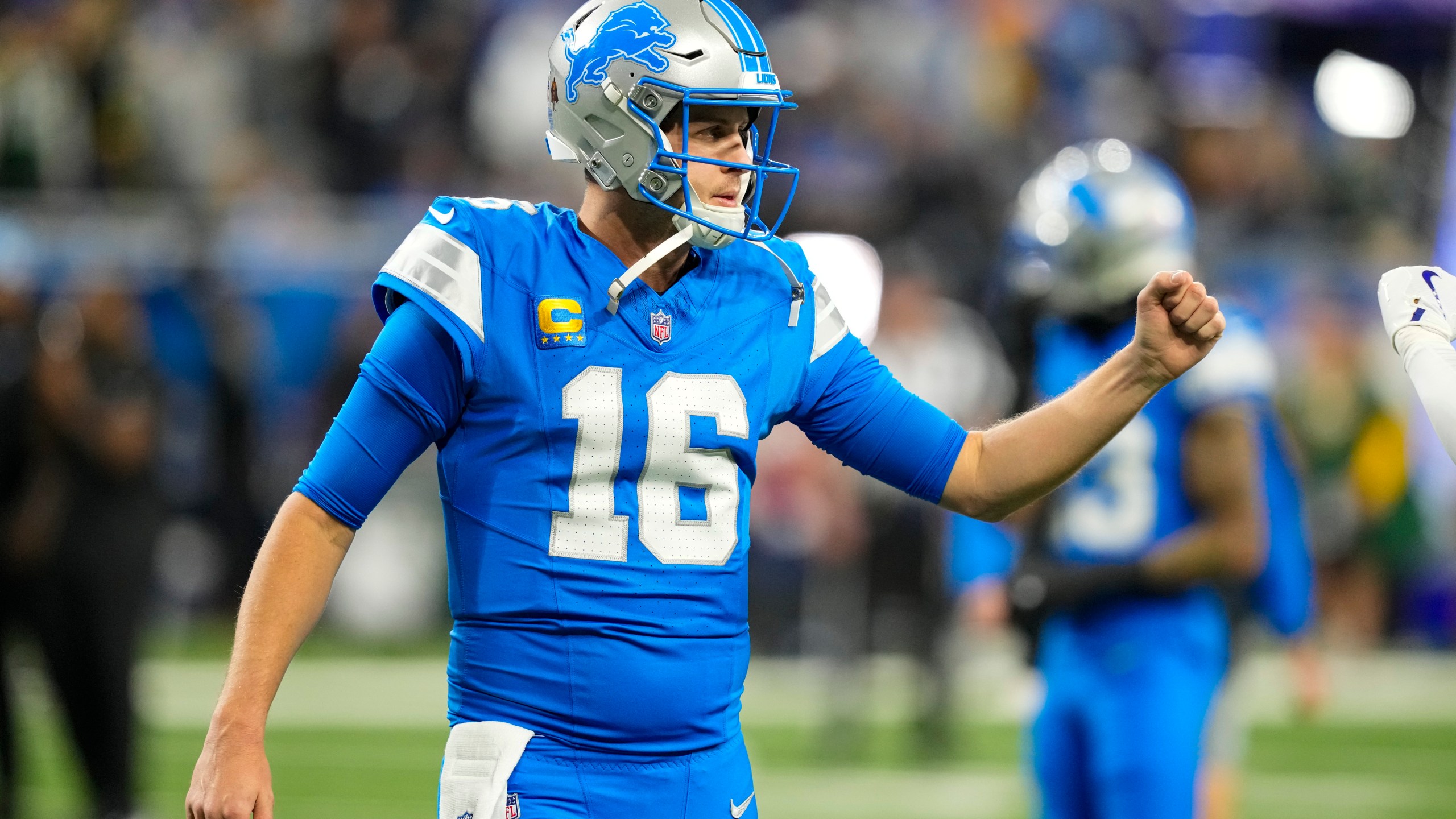 Detroit Lions quarterback Jared Goff (16) gestures before the start an NFL football game against the Green Bay Packers in Detroit, Thursday, Dec. 5, 2024. (AP Photo/Carlos Osorio)