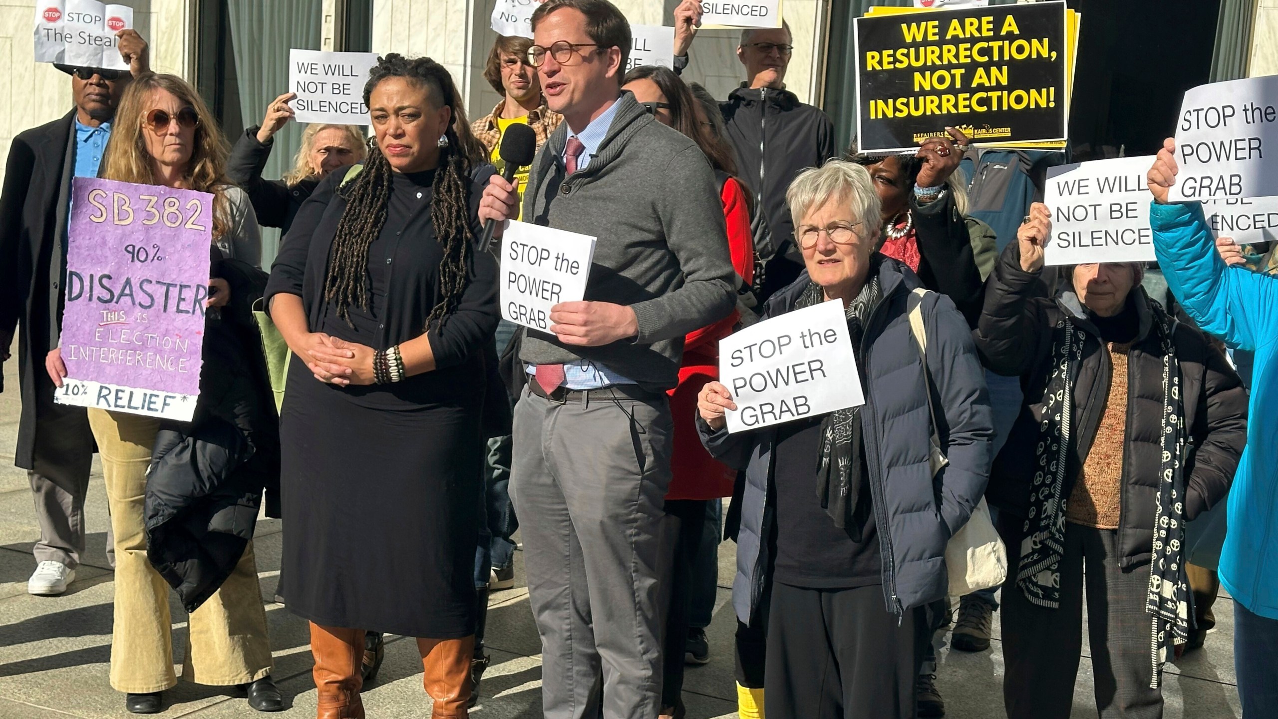 The Rev. Rob Stephens with the NC Poor People's Campaign speaks at a news conference outside the North Carolina Legislative Building in Raleigh, N.C. on Monday, Dec. 2, 2024. (AP Photo/Gary D. Robertson)