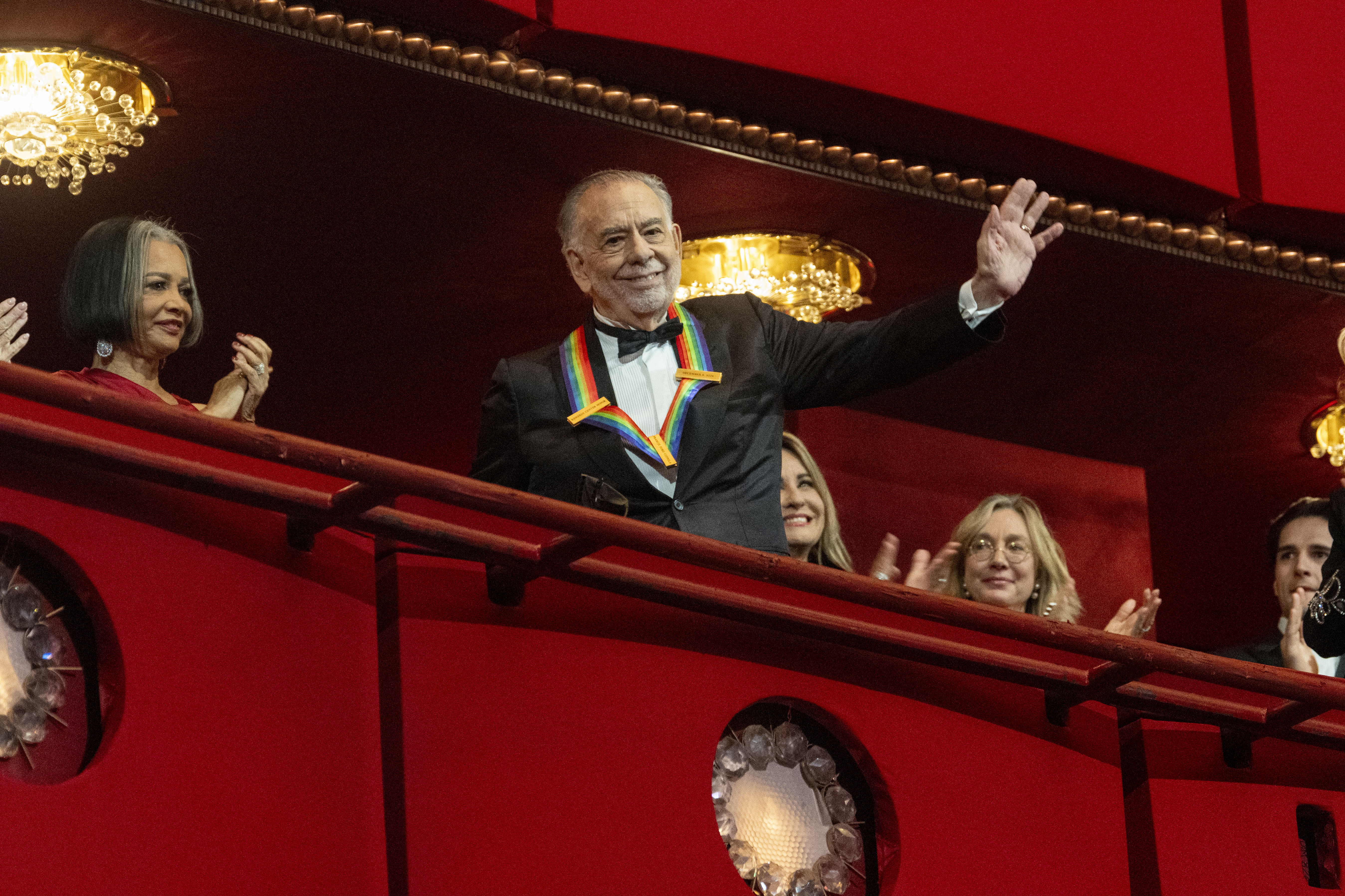 2024 Kennedy Center Honoree, director and filmmaker Francis Ford Coppola waves to the audience at the start of the Kennedy Center Honors Gala, Sunday, Dec. 8, 2024, in Washington. (AP Photo/Kevin Wolf)