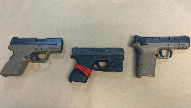 A photo released by the Kalamazoo Department of Public Safety shows three guns that were recovered Dec. 5, 2024.